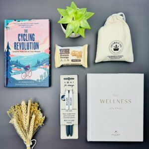 A picture of the range of products and gifts for bike lovers that are included in the Mindful Cyclist Gift Hamper.