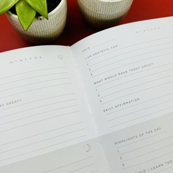 A picture of the Myga five minute journal that is included in the Walkers Wellness Box.