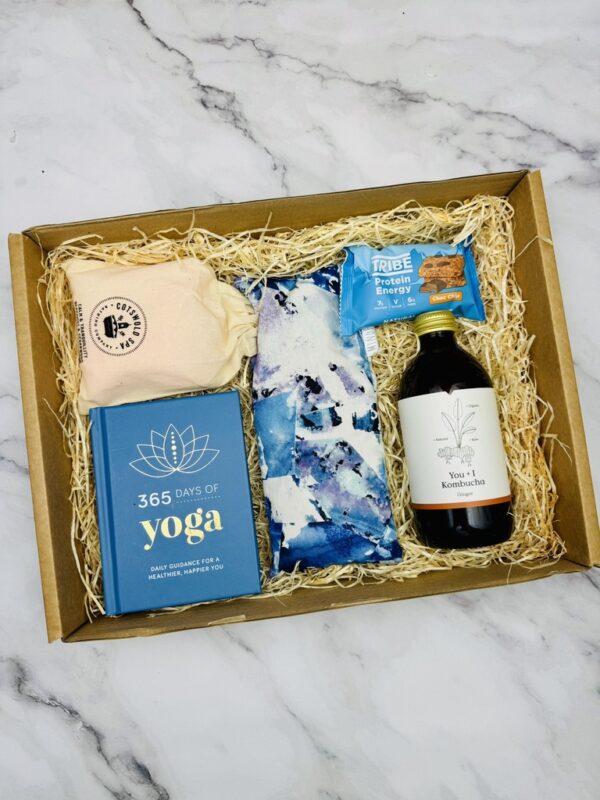 A picture of the products that are included in the Yoga Treat Gift Box. A perfect gift for yogi friends and family.